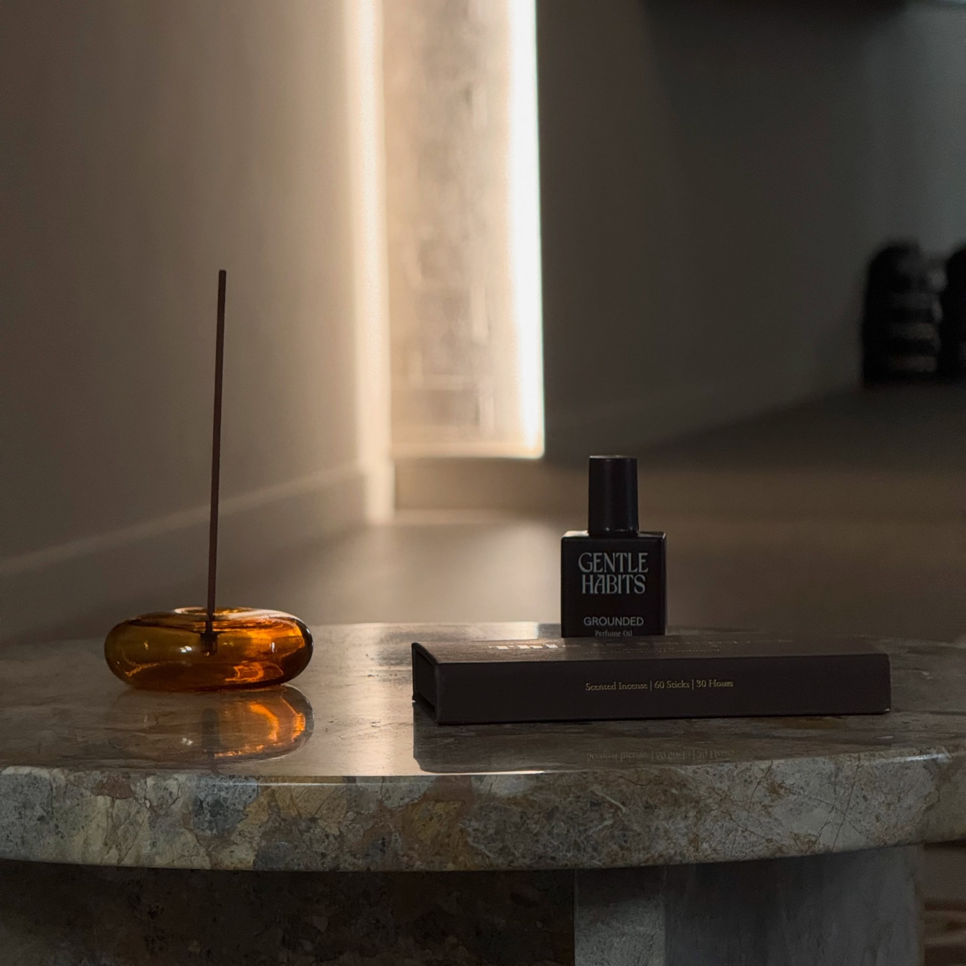 Gentle Habits incense on marble table